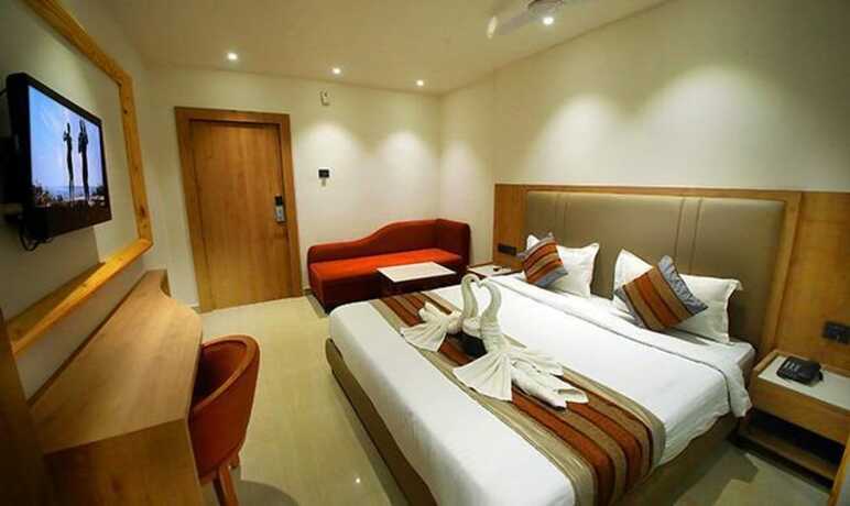 Imagen de la habitación del Hotel FabPrime Surya. Foto 13