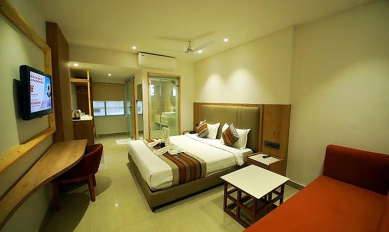 Imagen de la habitación del Hotel FabPrime Surya. Foto 14