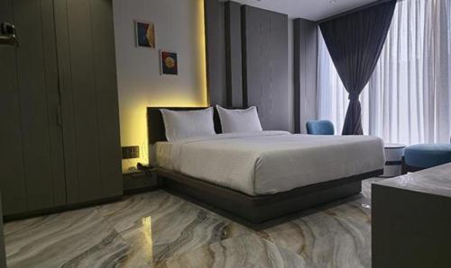 Imagen de la habitación del Hotel FabPrime The Grey Circle. Foto 20