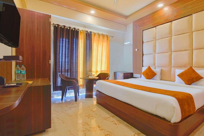 Imagen de la habitación del Hotel FabPrime The Royal Galaxy. Foto 17