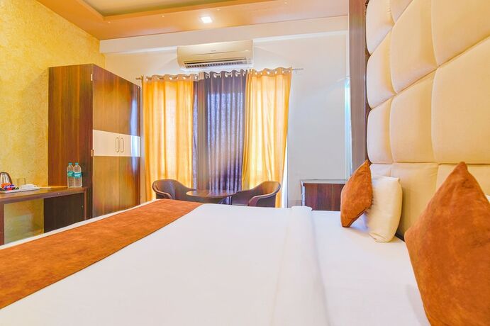Imagen de la habitación del Hotel FabPrime The Royal Galaxy. Foto 18