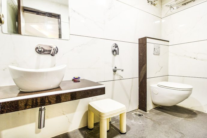 Imagen de la habitación del Hotel FabRajnandani Residency. Foto 4