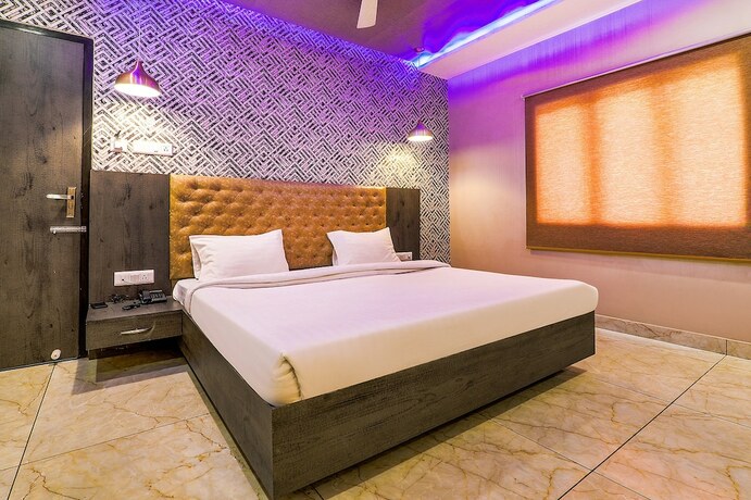 Imagen de la habitación del Hotel FabRudra Inn and Cafe I. Foto 20
