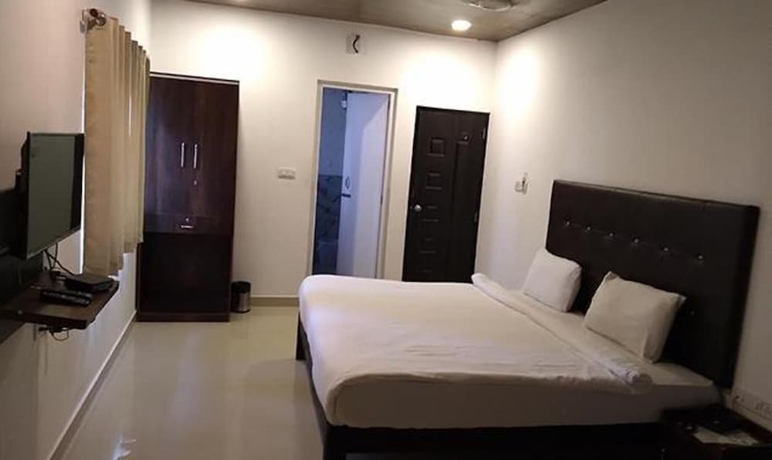Imagen de la habitación del Hotel Fabexpress Balaji Inn. Foto 8