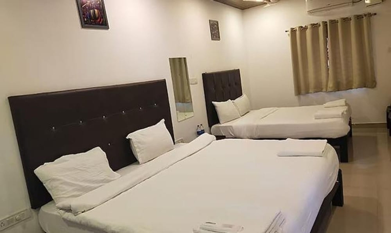 Imagen de la habitación del Hotel Fabexpress Balaji Inn. Foto 9