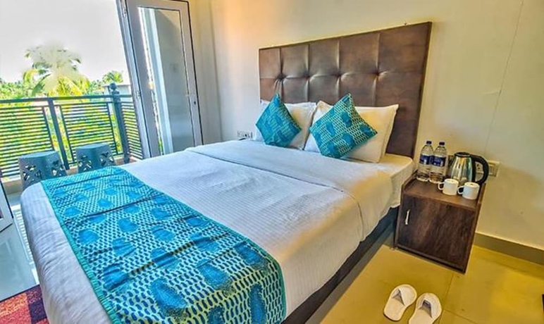 Imagen de la habitación del Hotel Fabexpress Balaji Inn. Foto 12