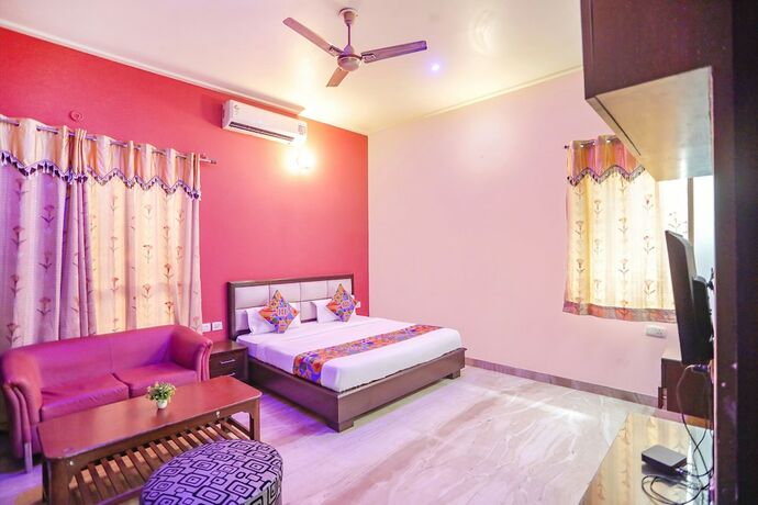 Imagen de la habitación del Hotel Fabexpress Divine Inn. Foto 19