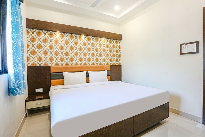 Imagen de la habitación del Hotel Fabexpress Geeta Palace. Foto 20