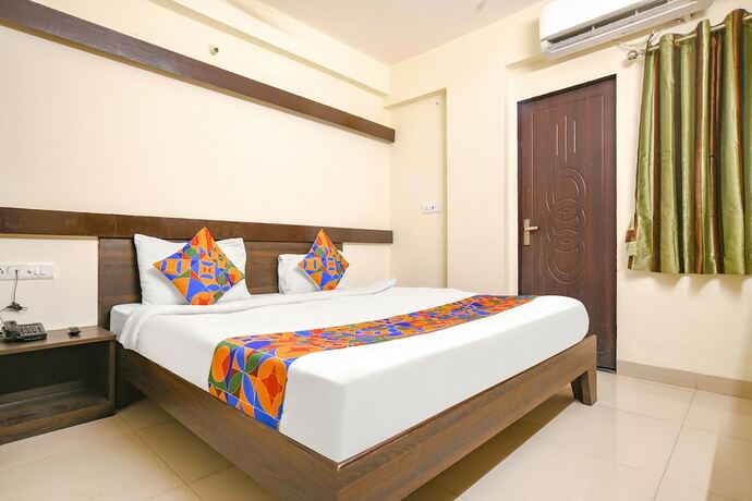 Imagen de la habitación del Hotel Fabexpress Golden Villa. Foto 19