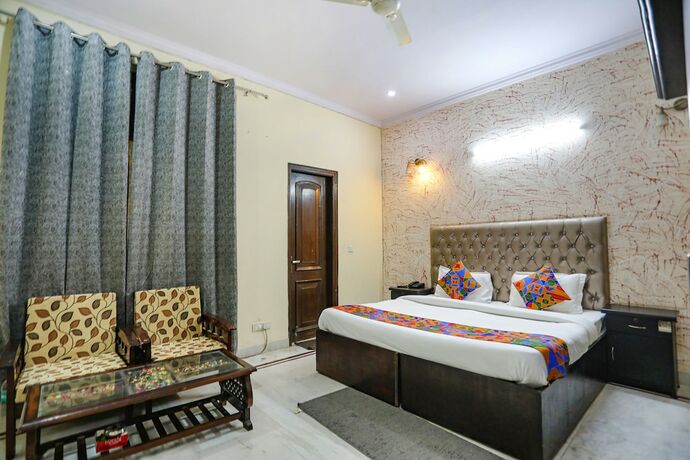 Imagen de la habitación del Hotel Fabexpress Hm Palace. Foto 20