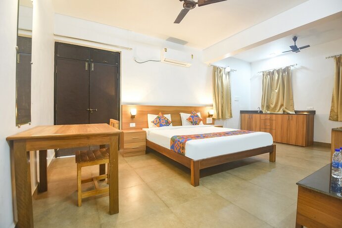 Imagen de la habitación del Hotel Fabexpress Holiday Suites. Foto 18