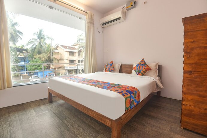Imagen de la habitación del Hotel Fabexpress Holiday Suites. Foto 19