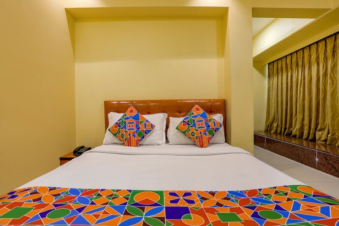 Imagen de la habitación del Hotel Fabexpress Jayshree. Foto 19