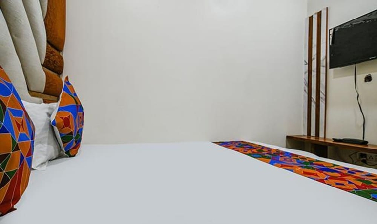 Imagen de la habitación del Hotel Fabexpress Jugnu Palace. Foto 8