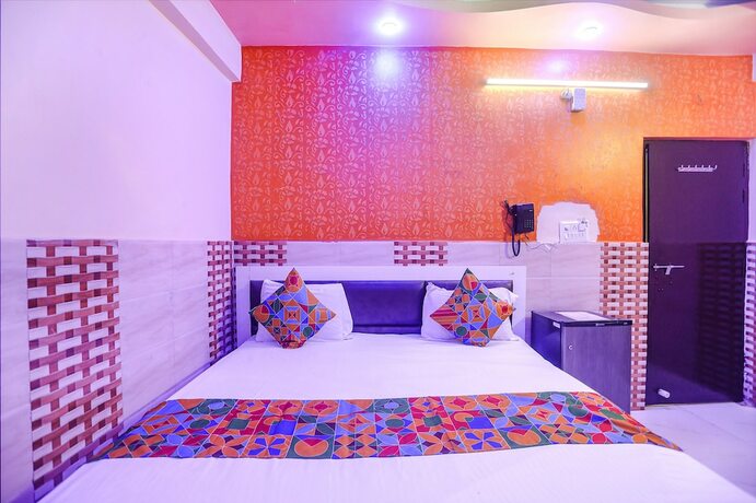 Imagen de la habitación del Hotel Fabexpress Kanha Dham. Foto 19