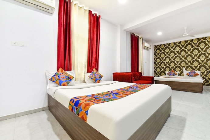 Imagen de la habitación del Hotel Fabexpress King Mansion. Foto 6