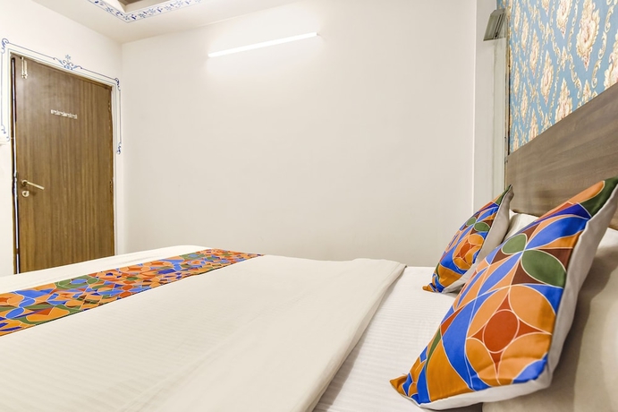 Imagen de la habitación del Hotel Fabexpress King Mansion. Foto 13