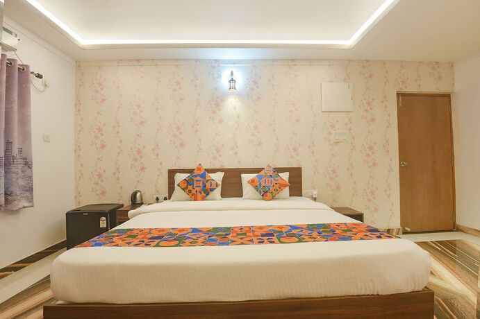 Imagen de la habitación del Hotel Fabexpress Ma Homes. Foto 17