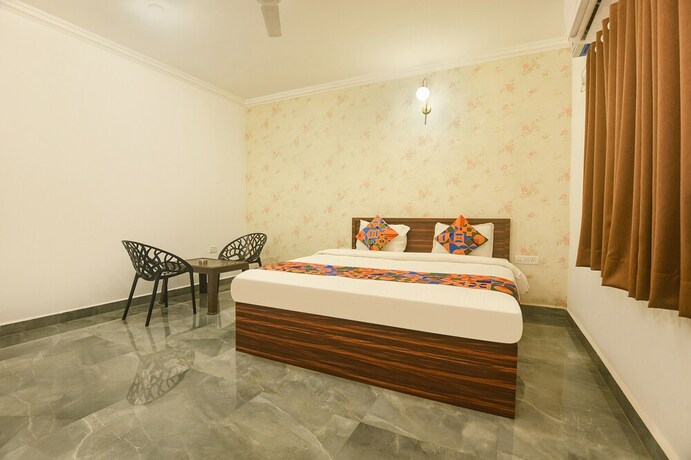 Imagen de la habitación del Hotel Fabexpress Ma Homes. Foto 20