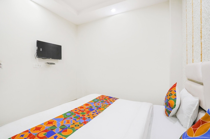 Imagen de la habitación del Hotel Fabexpress Mahi Ganga Heritage. Foto 8