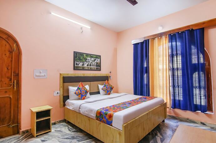Imagen de la habitación del Hotel Fabexpress Malti Guest House. Foto 17