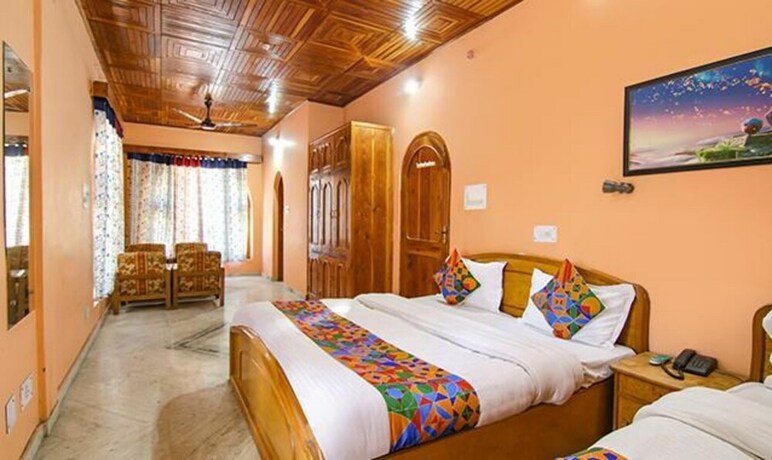 Imagen de la habitación del Hotel Fabexpress Malti Guest House. Foto 20