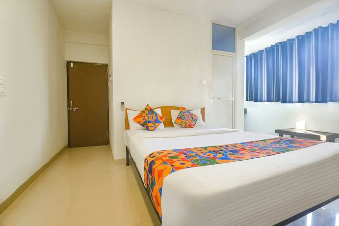 Imagen de la habitación del Hotel Fabexpress Morjim Sea Waves. Foto 20