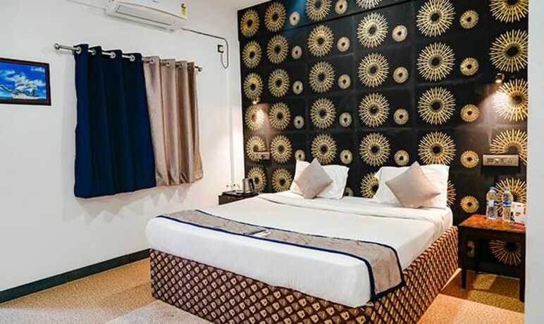 Imagen de la habitación del Hotel Fabexpress Paroza Suites. Foto 19