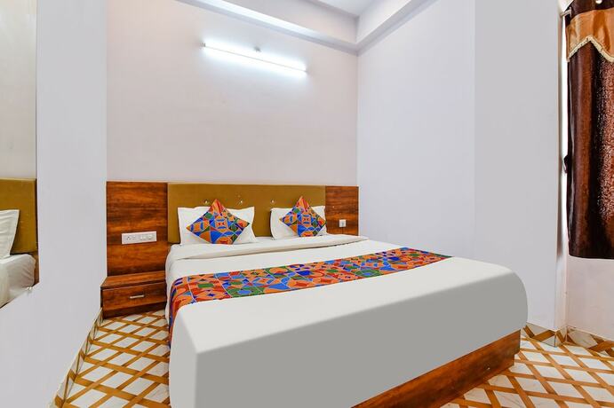 Imagen de la habitación del Hotel Fabexpress Raj Palace. Foto 19