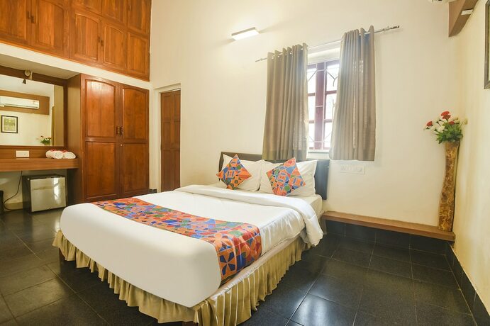 Imagen de la habitación del Hotel Fabexpress Royal Baga Residency. Foto 17
