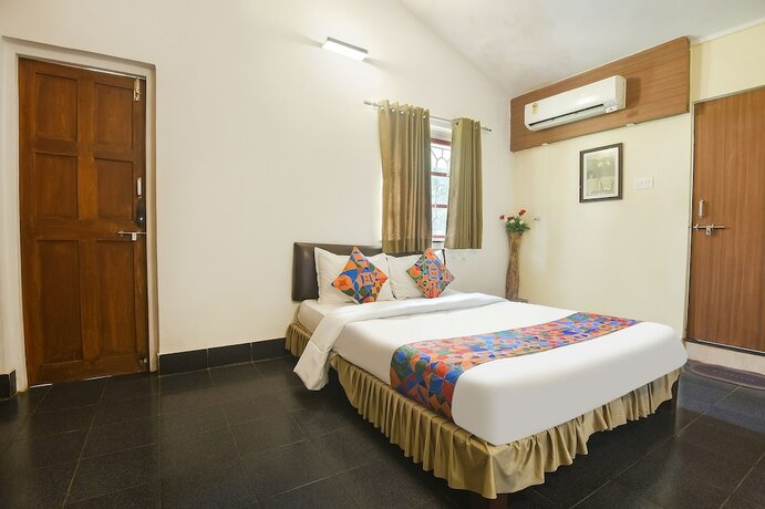 Imagen de la habitación del Hotel Fabexpress Royal Baga Residency. Foto 18