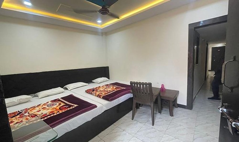Imagen de la habitación del Hotel Fabexpress Rudraksh Palace. Foto 11