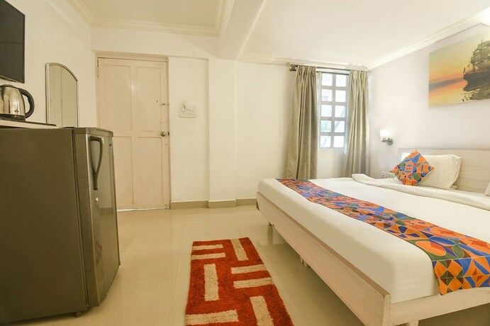 Imagen de la habitación del Hotel Fabexpress The Golden Leaf. Foto 23