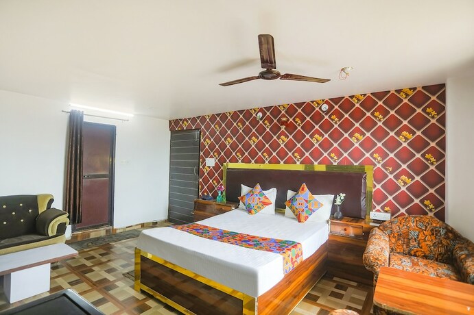 Imagen de la habitación del Hotel Fabexpress Umbrella. Foto 18
