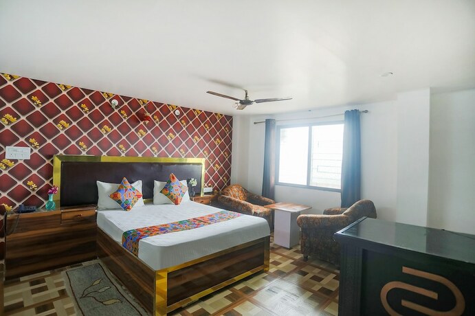 Imagen de la habitación del Hotel Fabexpress Umbrella. Foto 19