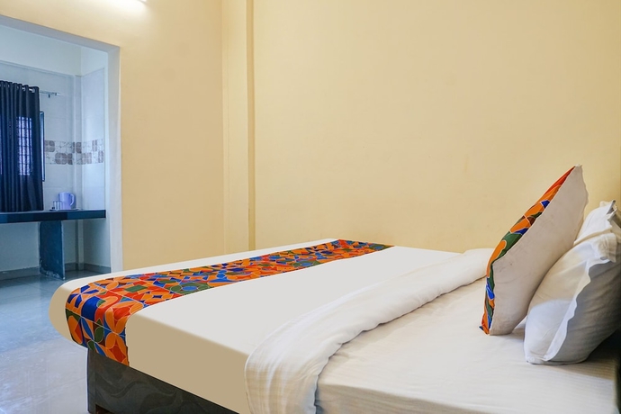 Imagen de la habitación del Hotel Fabexpress Vaishnav Inn. Foto 9