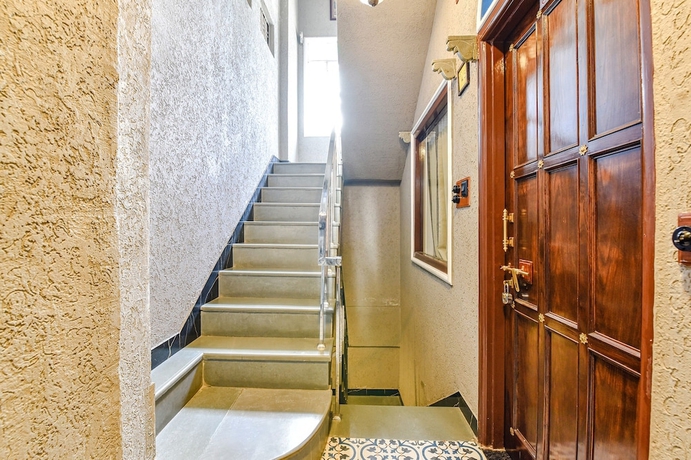Imagen de los interiores del Hotel Fabhotel Ambika Chirwa House. Foto 15