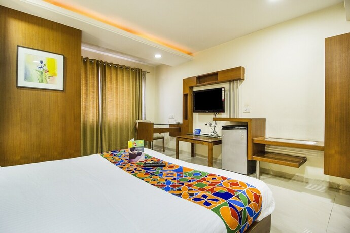Imagen de la habitación del Hotel Fabhotel Amrit Residency. Foto 18