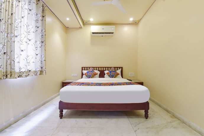 Imagen de la habitación del Hotel Fabhotel Bayan Elegance. Foto 7