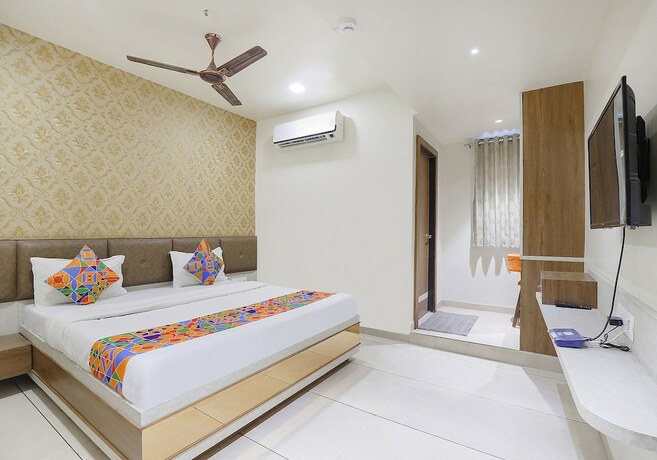 Imagen de la habitación del Hotel Fabhotel Bharosa Inn. Foto 18