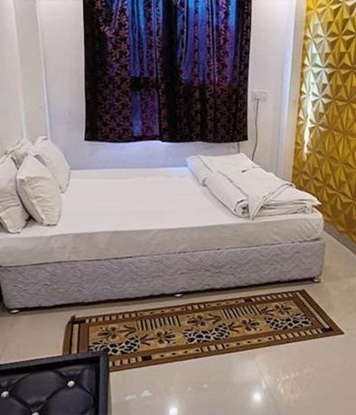 Imagen de la habitación del Hotel Fabhotel Buddha Saalt. Foto 16