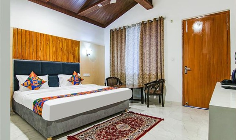 Imagen de la habitación del Hotel Fabhotel Corbett Tiger Resort. Foto 20