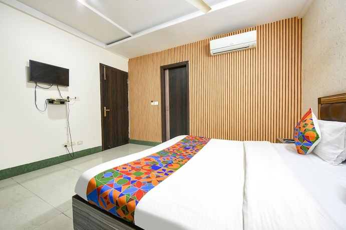 Imagen de la habitación del Hotel Fabhotel Ess Pee Grand. Foto 8