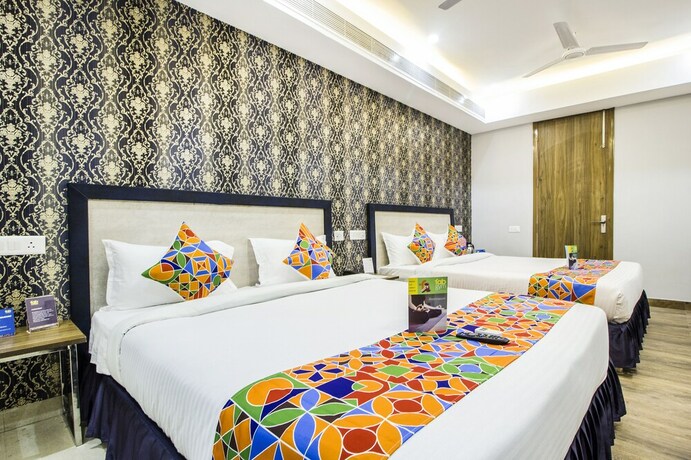 Imagen de la habitación del Hotel Fabhotel Galleria Inn. Foto 16