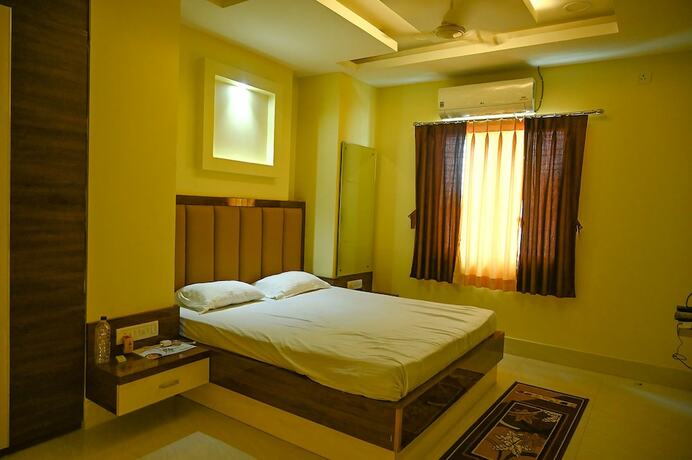 Imagen de la habitación del Hotel Fabhotel Golden Bliss. Foto 19