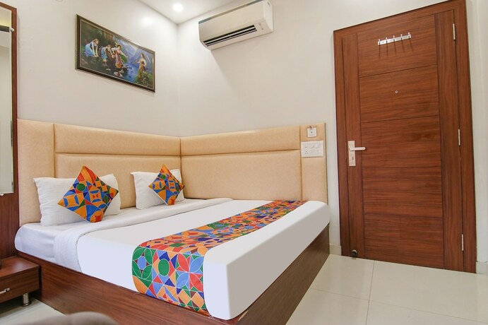 Imagen de la habitación del Hotel Fabhotel Golden Enterprise. Foto 19