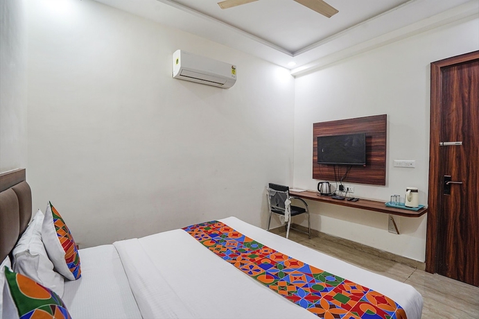 Imagen de la habitación del Hotel Fabhotel Golden Grand. Foto 10