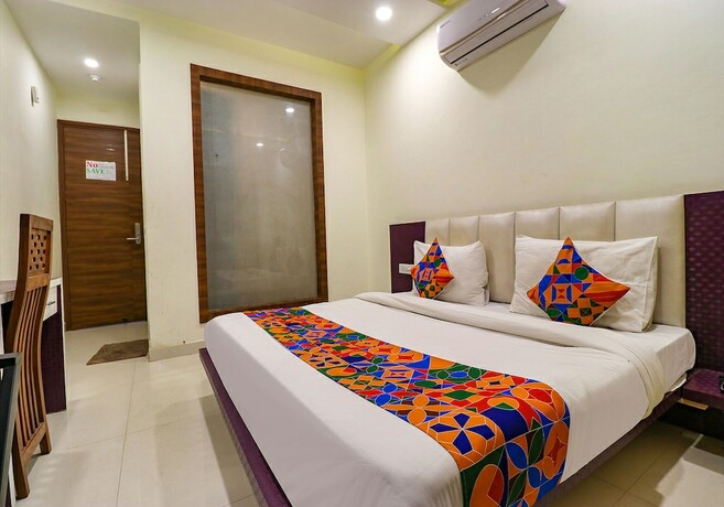 Imagen de la habitación del Hotel Fabhotel Golden Home. Foto 15