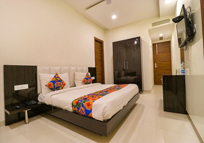 Imagen de la habitación del Hotel Fabhotel Golden Home. Foto 16