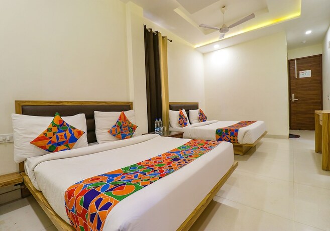 Imagen de la habitación del Hotel Fabhotel Golden Home. Foto 17